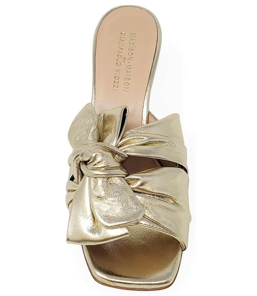 
                      
                        Gold Leather Bow Tie Mule
                      
                    